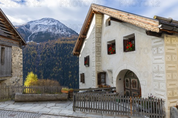 Engadin house in front of mountain peaks, historic houses, Guarda, Engadin, Graubünden, Switzerland