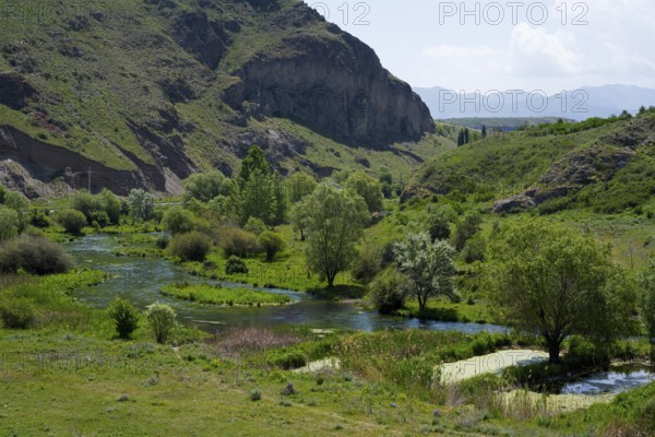 Picturesque river landscape with green hills and trees, Vorotan river, landscape near Sisian, Sisian, Syunik province, historic Sangesur, Armenia