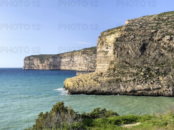 Rugged high cliffs on the Mediterranean Sea of Gozo Island, Gozo, Malta