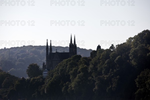 Pilgrimage Church of St. Apollinaris, also Apollinaris Church on Apollinarisberg in Remagen looking back as a silhouette, Rhineland-Palatinate, Germany