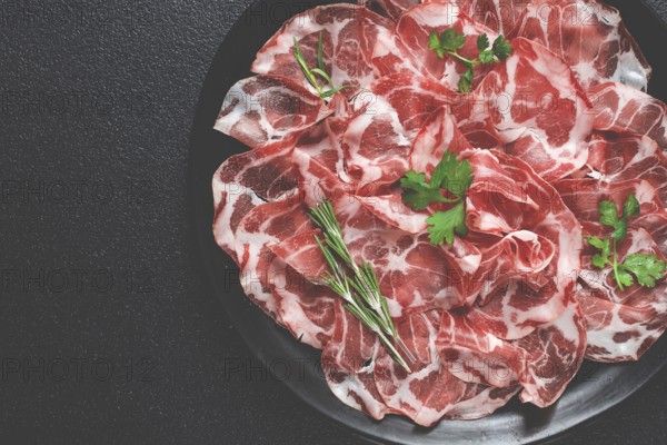 Sliced cured ham, prosciutto, italian dish, delicacy, parma ham, top view, no people