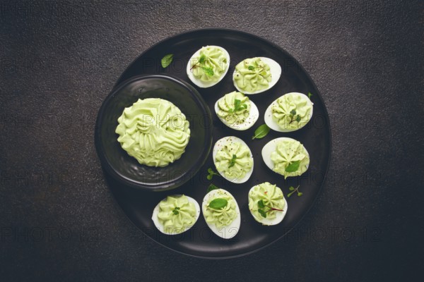 Snack, stuffed eggs with avocado, homemade, no people