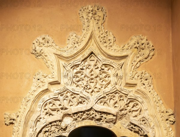 Ornate doorway detail in the Throne Room from time of the Catholic monarchs, Aljafería Palace, Zaragoza, Aragon, Spain