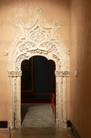 Ornate doorway detail in the Throne Room from time of the Catholic monarchs, Aljafería Palace, Zaragoza, Aragon, Spain