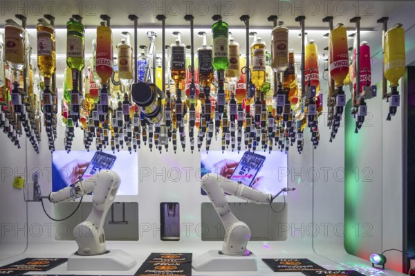 Las Vegas, Nevada - Robotic bartenders mix and serve drinks at the 'Tipsy Robot' in the Venetian Resort