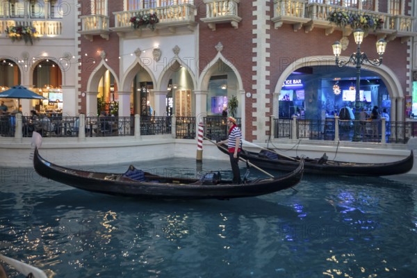 Las Vegas, Nevada - A gondolier looks for customers on the indoor canals at The Venetian Resort