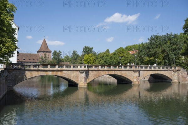 Maxbrücke with reflection, Pegnitz river, Nuremberg, Middle Franconia, Franconia, Bavaria, Germany