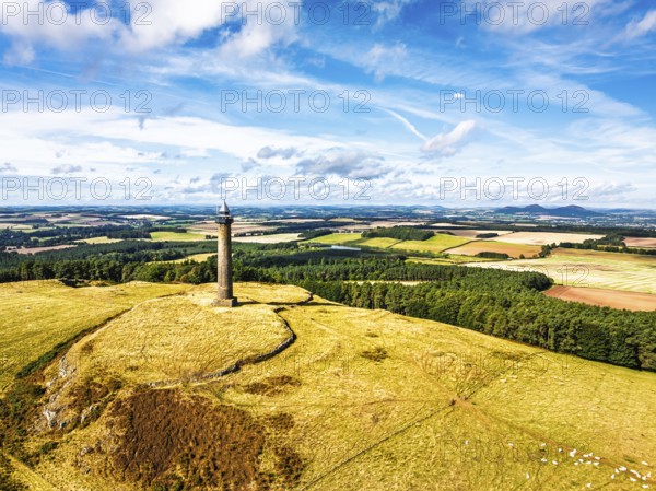Waterloo Monument over Scottish fields and farms from a drone, Jedburgh, Scotland, UK