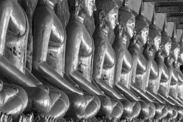 Gilded Buddha statues (Bhumispara mudra: Buddha Gautama at the moment of enlightenment), Wat Suthat Thepwararam, Royal Temple, Phra Nakhon, Bangkok, Thailand