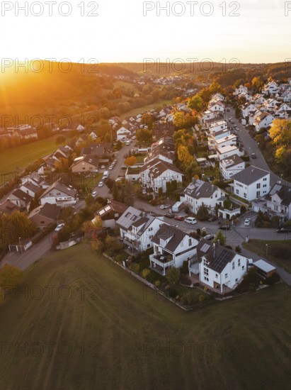 Residential area on the edge of a settlement in autumn sunset light, Deufringen, Aidlingen, Böblingen district, Germany