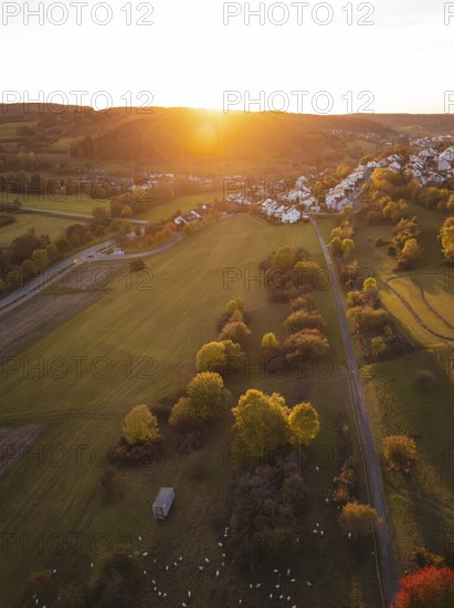 Fields and village at sunset surrounded by autumn light, Deufringen, Aidlingen, Böblingen district, Germany