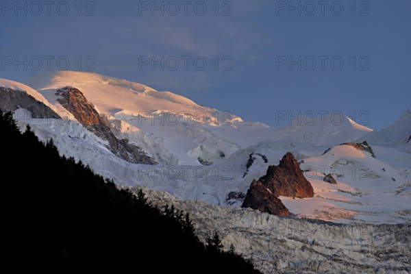 Snow-covered Mont-Blanc in the light of the setting sun, Chamonix-Mont-Blanc, Haute-Savoie, France