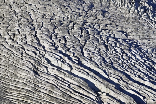 View from the Télécabine Panorama Railway of the glacial crevices of the Glacier du Géant, Chamonix-Mont-Blanc, Haute-Savoie, France