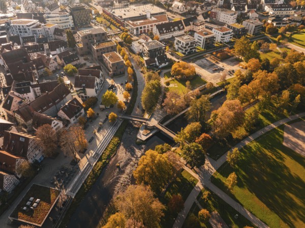 Aerial view of a city with river and bridge in autumn, Nagold, Black Forest, Germany