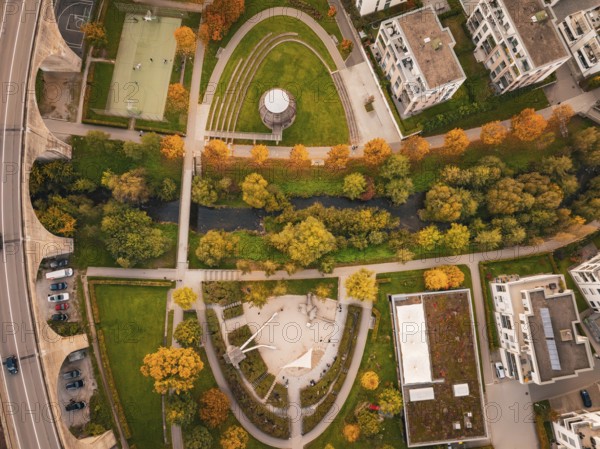 City view with a curved viaduct surrounded by houses and autumn landscape, Nagold, Black Forest, Germany