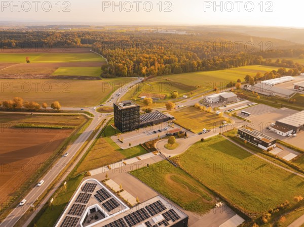 Drone shot of a rural area with forests and fields in soft autumn light, Nagold, Black Forest, Germany