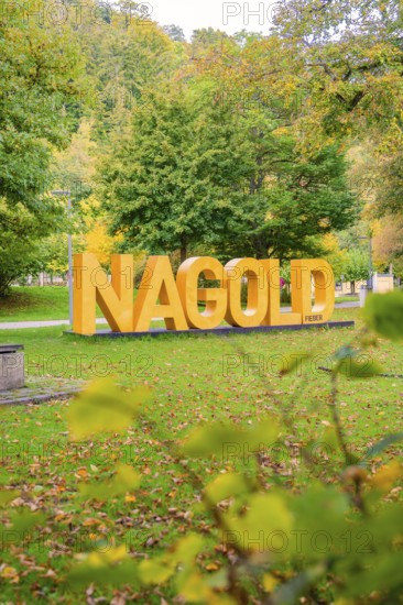 Park with big yellow letters that indicate Nagold, surrounded by autumnal nature, Nagold, Black Forest, Germany
