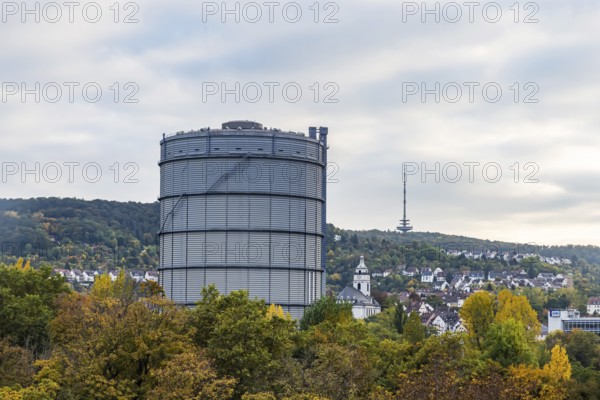 Stuttgart East with the 100-meter high gas boiler. The landmark of the complex is the 100-meter high gasometer. For a long time, it was Europe's largest disk gas container still in operation. It is a listed building. Stuttgart, Baden-Württemberg, Germany