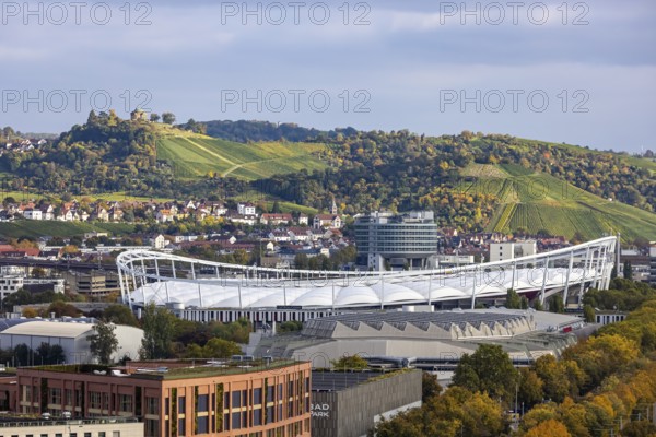 Neckarpark Stuttgart with Hanns-Martin-Schleyer-Hall and MHP Arena. In the center of the picture, Mercedes-Benz Van Technology Center (VTC) . Burial chapel in Württemberg. Stuttgart, Baden-Württemberg, Germany