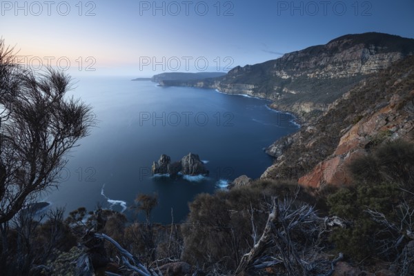 Shipstern Bluff viewpoint. Blue hour with long exposure showing sunset over the cliffs of Cape Raoul, Tasman Peninsula, Tasmania, Australia