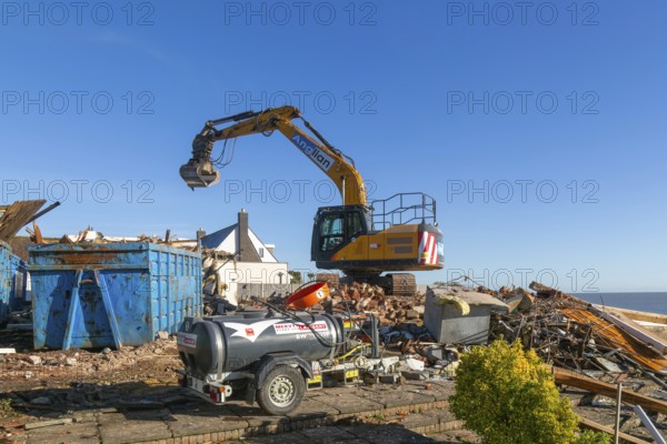 Demolition of Jean Flick's house, The Warren, Thorpeness, Suffolk, England, UK due to rapid coastal erosion of the North Sea coast, October 2025