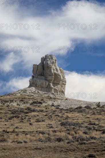 Midwest, Wyoming - Teapot Rock, for which Teapot Dome was named. The Teapot Dome oil field, and two other sites in California, were part of a major bribery scandal during the Warren Harding administration in 1922. The 'handle' and 'spout' on the rock teapot tell off in 1930 and 1962
