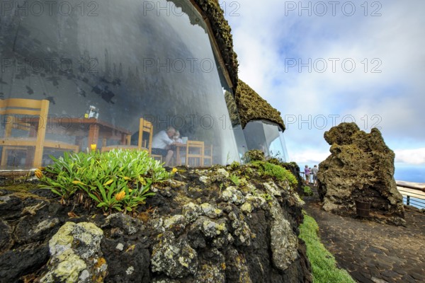 Panoramic window in a building designed by Cesar Manrique with the collaboration of Jesús Soto and architect Eduardo Caceres, without right angles corners at viewpoint tourist attraction El Mirador del Río on the summit of the 474 meter high Risco de Famara in the Famarama region with panoramic views of the Chinijo Archipelago, Lanzarote, Canary Islands, Canary Islands, Spain
