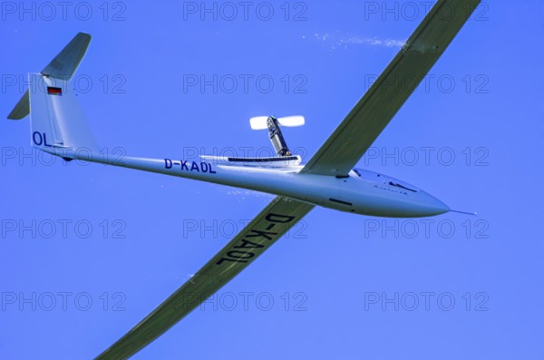 A Schempp-Hirth Nimbus 4M motor glider, D-KAOL registration, during a screening as part of an air show at the Rossfeld Air Sports Association on Rossfeld in Metzingen-Glems, Baden-Württemberg, Germany, for editorial use only