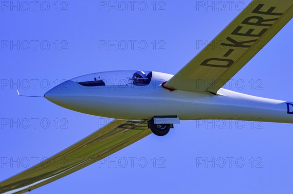 A Schempp-Hirth Nimbus 3MR motor glider, registration D-KERF, during a screening as part of an air show at the Rossfeld Air Sports Association on Rossfeld in Metzingen-Glems, Baden-Württemberg, Germany, for editorial use only