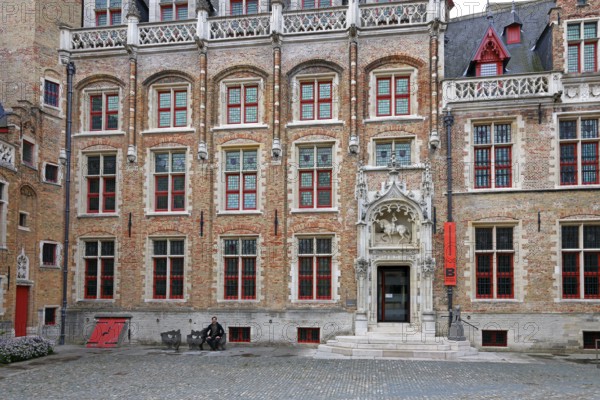 Gruuthusemuseum with equestrian statue of Lodewijk van Gruuthuse above the entrance portal in the historic old town of Bruges, UNESCO World Heritage Site, Flanders, Belgium