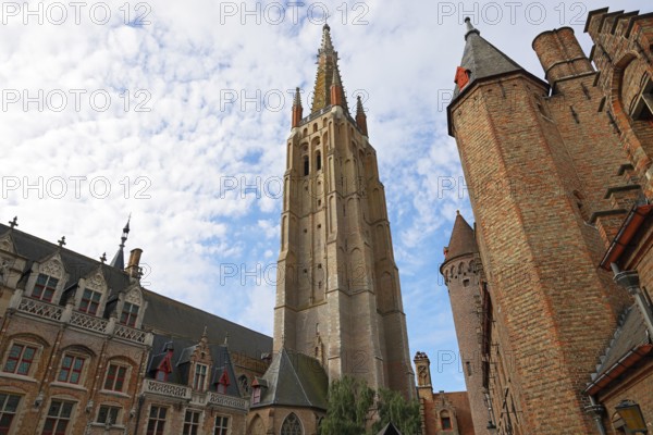 Gruuthusemuseum and mighty tower of the Church of Our Lady, Onze-Lieve-Vrouwekerk, in the historic old town of Bruges, UNESCO World Heritage Site, Flanders, Belgium