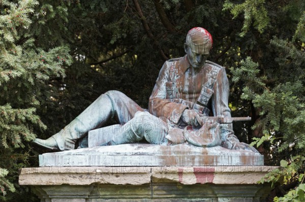 Colonial War Memorial, head sprayed with red paint, in commemoration of the Herero and Nama genocide in German Southwest Africa, Düsseldorf, North Rhine-Westphalia, Germany