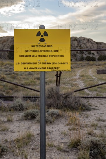 Jeffrey City, Wyoming - 'No Trespassing' signs adorn the perimeter of a former uranium mine and mill which operated from 1957 until 1981. Uranium tailings and other radioactive debris have been buried and the site is now under the care of the Department of Energy