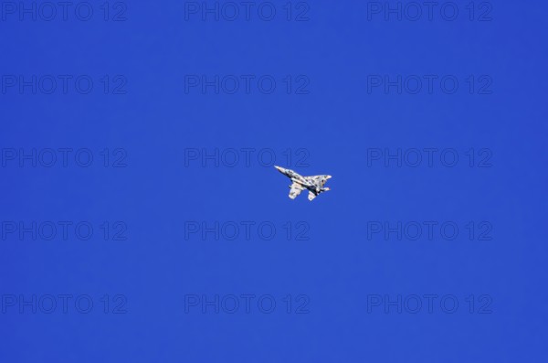A single-jet fighter jet during a flight demonstration as part of an air show at the Rossfeld Air Sports Association in Metzingen-Glems, Baden-Württemberg, Germany, for editorial use only