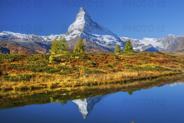 Matterhorn 4478 m with reflection in Leisee on the Sunnegga in autumn, Zermatt, Mattertal, Valais, Switzerland