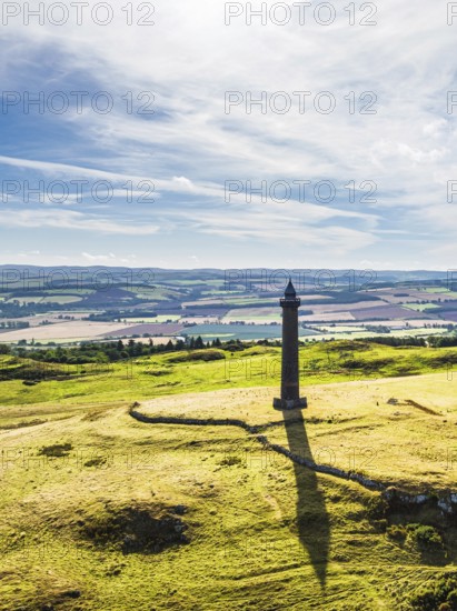 Waterloo Monument over Scottish fields and farms from a drone, Jedburgh, Scotland, UK