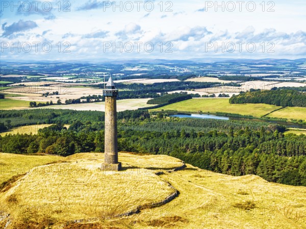 Waterloo Monument over Scottish fields and farms from a drone, Jedburgh, Scotland, UK
