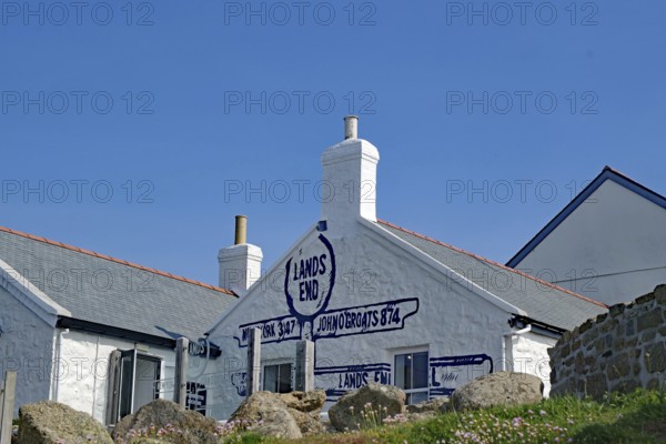 White House with painted distances and blue sky, Land's End, Cornwall, Great Britain