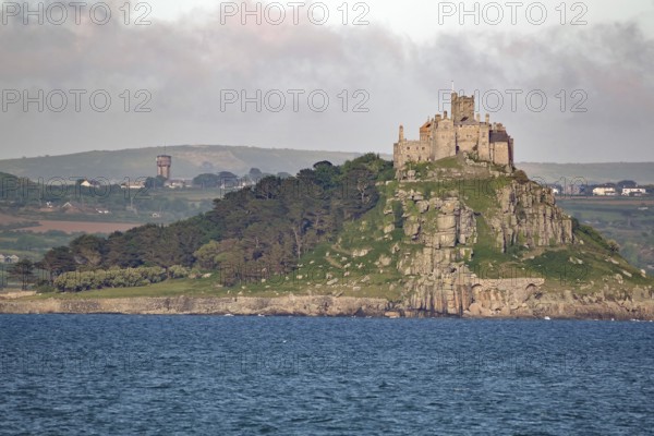 Medieval castle on a wooded seaside hill, St Michael's Mount, Cornwall, Great Britain