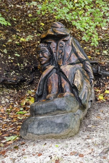 Wooden sculpture Der Haule, Pfullinger Sagenweg, stories and legends, by woodsaw artist Billy Tröge, Ursulaberg, Pfullingen, Baden-Württemberg, Germany