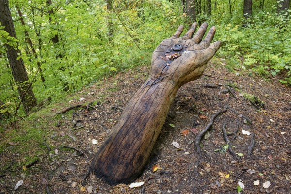 Wooden sculpture The Remmselesstein, Pfullinger Sagenweg, stories and legends, by woodsaw artist Billy Tröge, Ursulaberg, Pfullingen, Baden-Württemberg, Germany