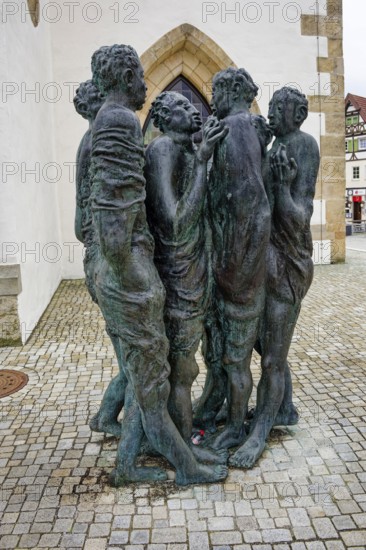 Bronze sculpture Disput, created by Munich artist Hubertus von Pilgrim, Marktplatz, Pfullingen, Baden-Württemberg, Germany