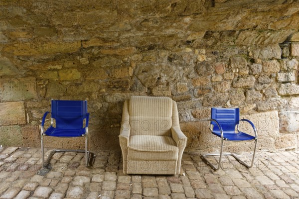 Parked furniture under a bridge arch, Rottenburg am Neckar, Baden-Württemberg, Germany