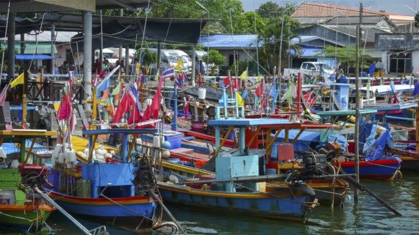 Fishing boats moored side by side in colors blue and red, Phang Nga Bay, Phang Nga Phang-nga Province, Thailand
