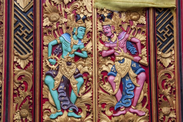 Colourful wood carving temple door in Hindu temple complex Pura Ulun Danu Bratan, Candi Kuning, Bratan Lake, Bali, Indonesia