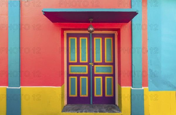 Colorful colonial architecture of historic center of Flores, Guatemala