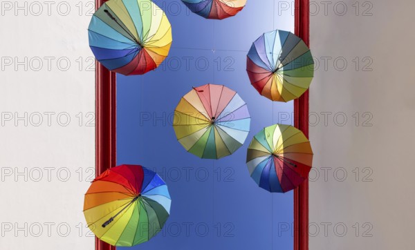 Argentina, Buenos Aires, Colourful Umbrella street in San Telmo district known for its boutiques, restaurants and shopping