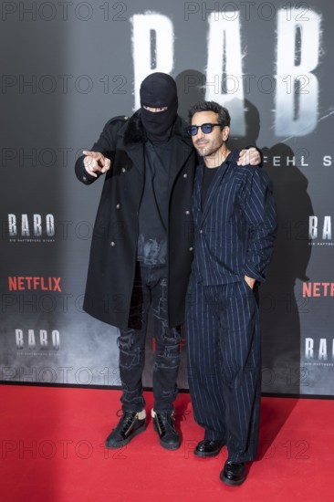 Aykut Anhan aka arrest warrant and Elyas M'Barek at the premiere of the Netflix film Babo in the Astor Film Lounge Berlin on 24.10.2025