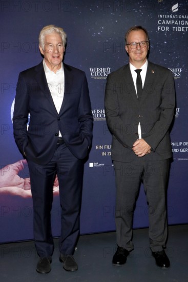 Richard Gere and Kai Müller (managing directors of International Campaign for Tibet) at a photo call in front of the presentation of the documentary about the life of the Dalai Llama, WISDOM OF HAPPINESS whose executive producer he is, at the Kulturbrauerei in Berlin on 24.10.2025