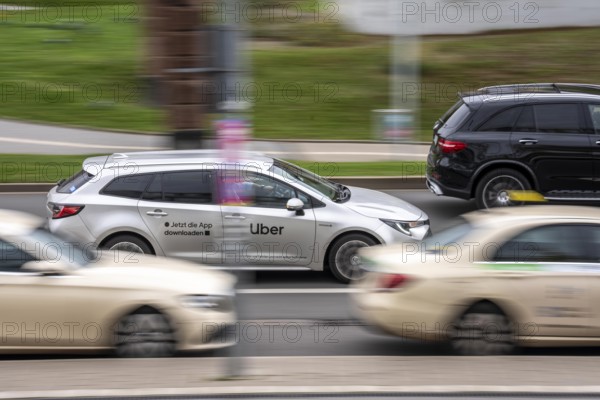 Uber rental car, drives past taxis, Düsseldorf-Bilk train station, taxi stand, competition, North Rhine-Westphalia